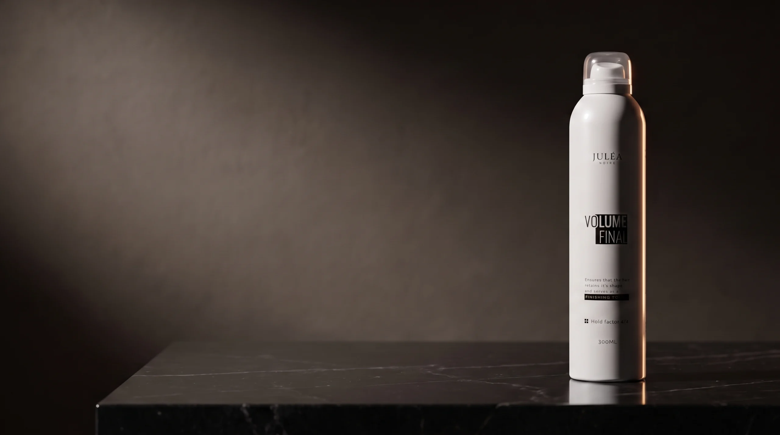 Juléa Noire Volume Final hairspray op zwart marmer